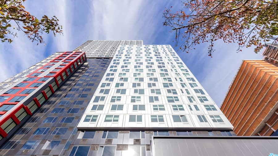 View from first floor looking up at a high-rise modular building